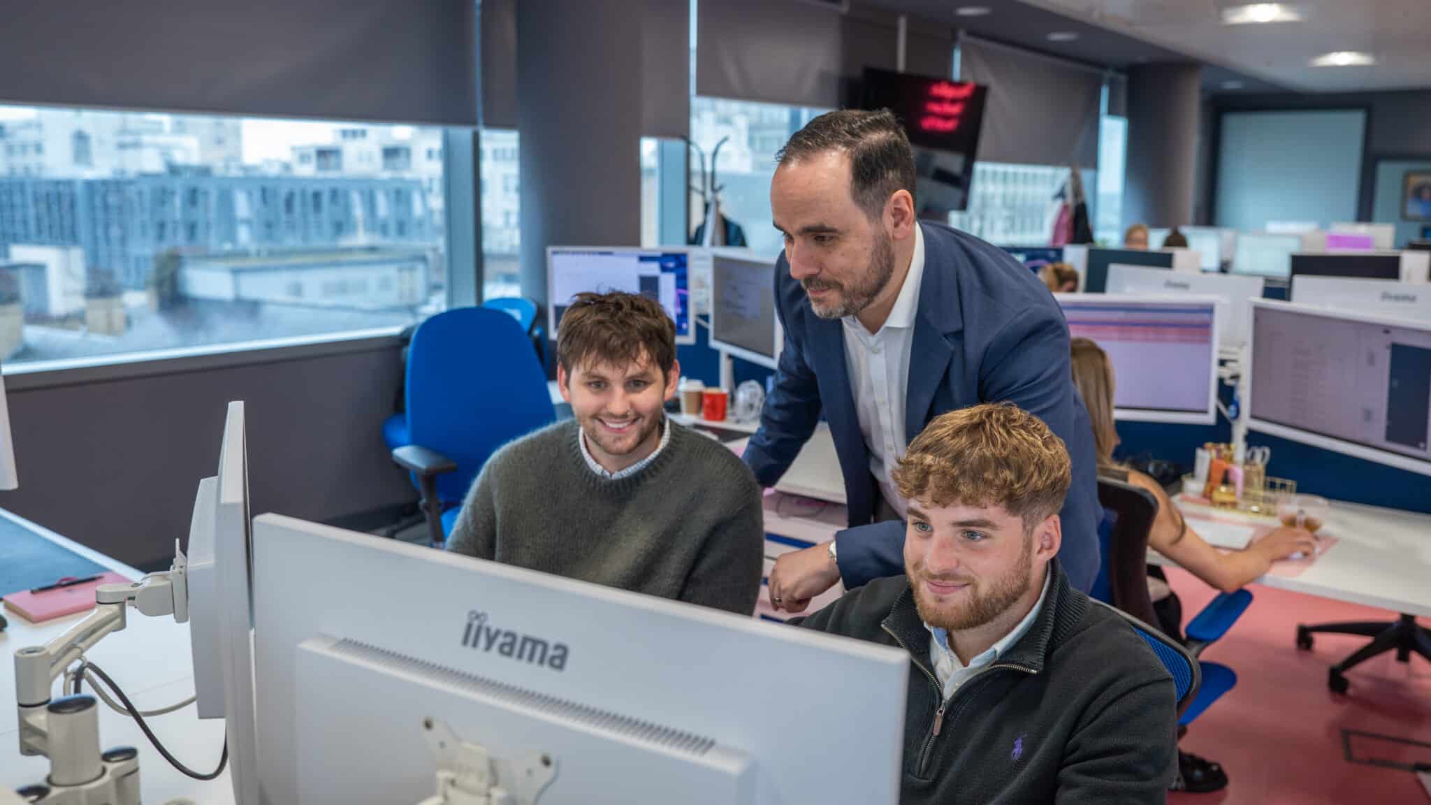 A photograph showing the CEL Solicitors team working on a crypto tracing report.